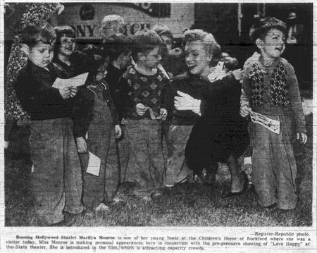 Lot #1016 Marilyn Monroe: An orphan herself, Marilyn makes a live appearance for the Marx Brothers film ‘Love Happy,’ with several Illinois youngsters - Image 4