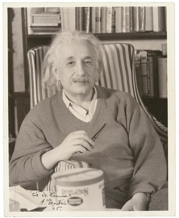 Lot #222 Albert Einstein: With WWII nearing an end and the atomic bomb nearing its reality, a relaxed Einstein sends greetings to a colleague - Image 1