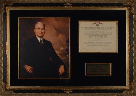 Lot #212 Harry S. Truman: Just two days before Hiroshima, President Truman presents the chief of the Allied photo reconnaissance section with the Legion of Merit for helping to defeat Nazi Germany - Image 1