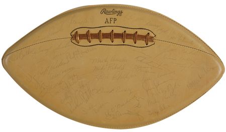 Lot #1122 Chicago Bears: Souvenir ball signed by over 30 teammates, including 'Papa' Bear, Dick Butkus, and the notoriously rare Brian Piccolo - Image 1