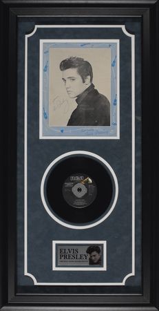Lot #851 Elvis Presley: The King' signs a 1957 portrait - Image 1