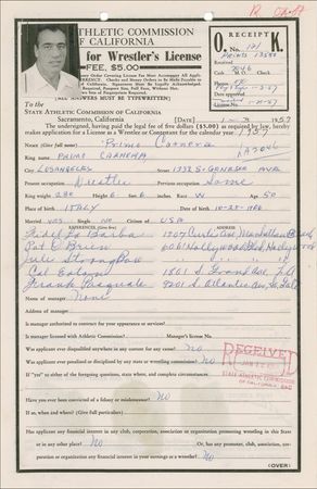 Lot #1157 Primo Carnera: Carnera leaves his massive mark on a wrestling application from his 1957 heavyweight championship year - Image 1