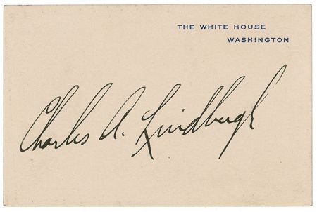 Lot #500 Charles Lindbergh: Lindbergh signs a White House card while lunching with President Calvin Coolidge in 1927 - Image 1