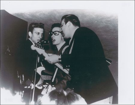Lot #817 Buddy Holly: Holly signs a popcorn box on a cold Minnesota night during the ill-fated 1959 Winter Dance Party Tour - Image 3