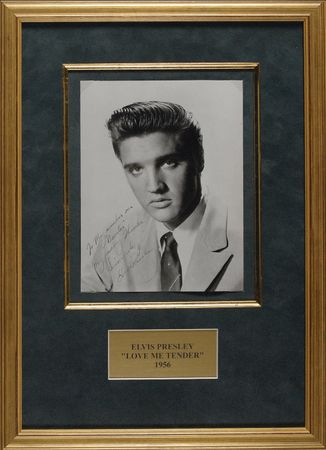 Lot #744 Elvis Presley: ‘The King’ signs a 1956 portrait ‘To my number one ‘Booster’ - Image 1