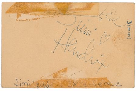Lot #870 Jimi Hendrix: Hendrix signature with candid concert photo - Image 1