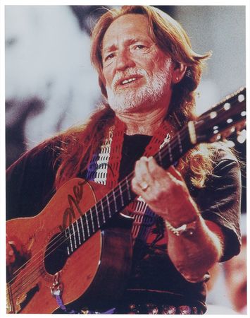 Lot #883 Willie Nelson Signed Photograph and Pickguard - Image 1