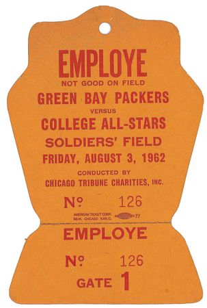 Lot #1474 Vince Lombardi: Lombardi signs a pass for the College All-Stars game at Soldiers? Field in 1962 - Image 1