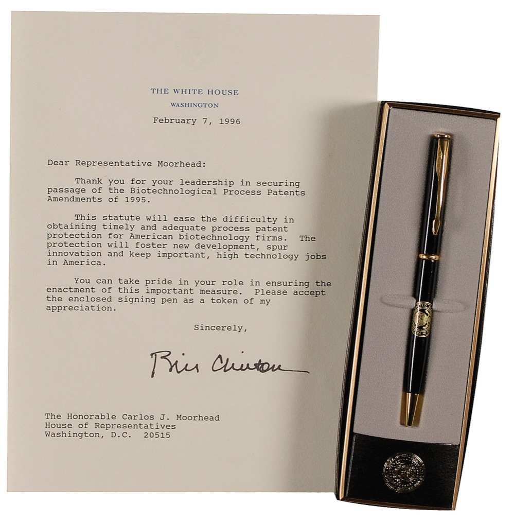 Lot 37 Bill Clinton: Clinton presents an ?enclosed signing pen? to Californian Congressman Moorhead for his role in passing ?the Biotechnological Process Patents Amendments?