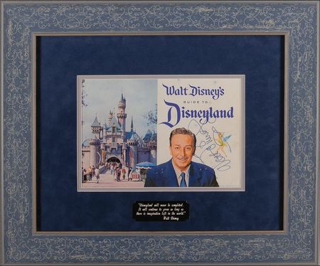 Lot #764 Walt Disney: Walt signs his 1959 guide to Disneyland - Image 1