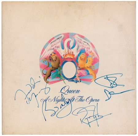 Lot #948 Queen: Freddie and the band sign a copy of A Night at the Opera - Image 1
