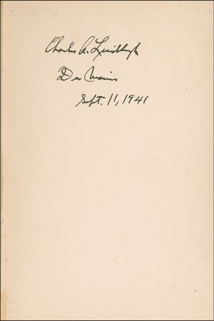 Lot #479 Charles Lindbergh: Lindbergh signs a first edition during his unwavering speech at an America First rally in 1941 - Image 1