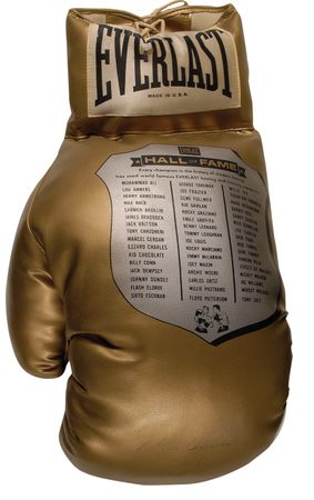 Lot #1330 Muhammad Ali: Ali signs a huge boxing glove in his final year as heavyweight champ - Image 1