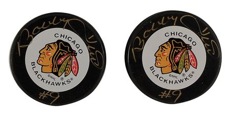 Lot #1452 Bobby Hull and Maurice Richard Pucks - Image 1