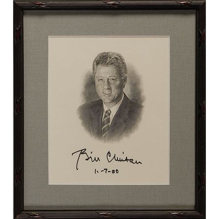 Lot #24 Bill Clinton: Clinton signs a portrait on