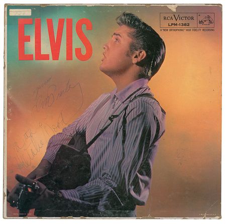 Lot #1058 Elvis Presley and Natalie Wood: Truly one-of-a-kind: Elvis and his companion Natalie Wood serendipitously sign his 1956 album during a visit to a Memphis eatery - Image 1