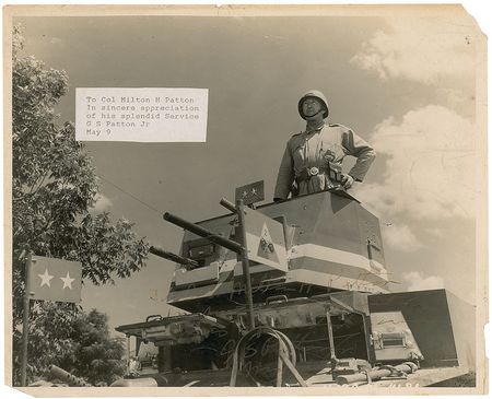 Lot #342 George S. Patton: Patton perched atop a machine gun turret - Image 1