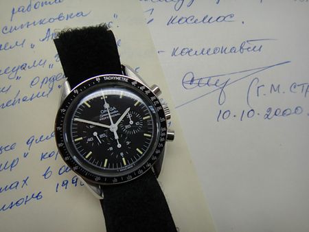 Lot #99 Omega Speedmaster Wristwatch and Glove - Image 15