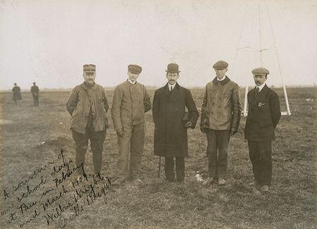 Lot #652 Wilbur and Orville Wright: Phenomenally rare photo of the Wrights with their first French pilot-pupils, inscribed, “A souvenir of our school days at Pau, in February and March 1909,” and signed by both - Image 3