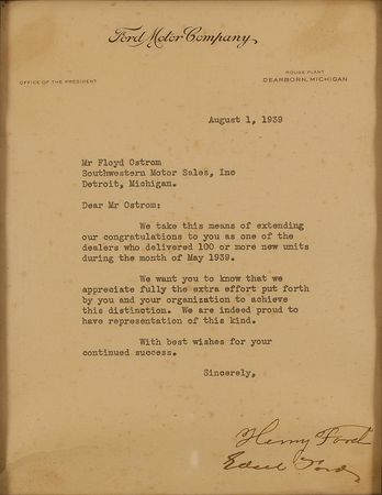 Lot #266 Henry and Edsel Ford: Henry and Edsel Ford congratulate a dealer for moving 100 cars in a month - Image 1