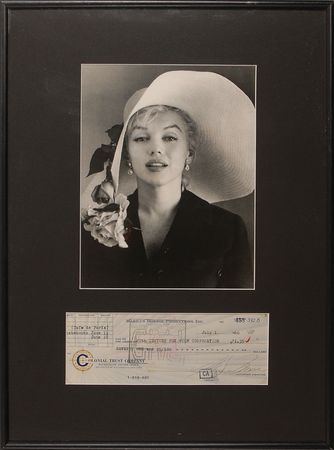 Lot #1208 Marilyn Monroe: Marilyn settles her bill at the elegant Cafe de Paris at 20th Century Fox - Image 1