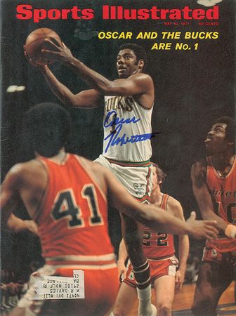 Lot #1414 Julius Erving and Oscar Robertson Magazines - Image 1