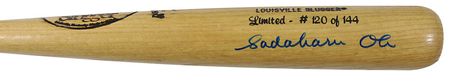 Lot #1329 Hank Aaron and Sadaharu Oh Baseball Bat - Image 1