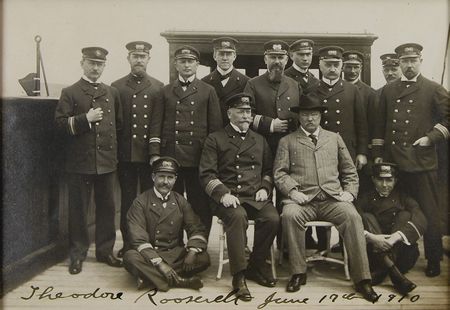 Lot #56 Theodore Roosevelt: Posing with the ship’s crew on his return from his famed Smithsonian-Roosevelt African Expedition - Image 1