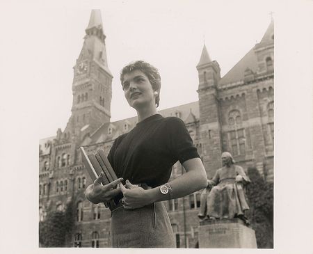 Lot #107 Jacqueline Kennedy Photograph Carrying College Books - Image 1
