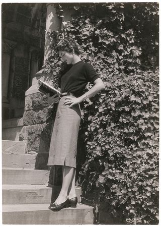 Lot #110 Jacqueline Kennedy Photograph Studying on Campus - Image 1