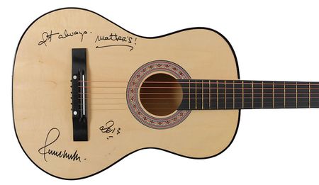 Lot #1106 Paul Anka Guitar and Book - Image 1