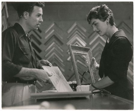 Lot #40 Jacqueline Kennedy Selecting a Frame for Her Husband?s Painting Photograph - Image 1