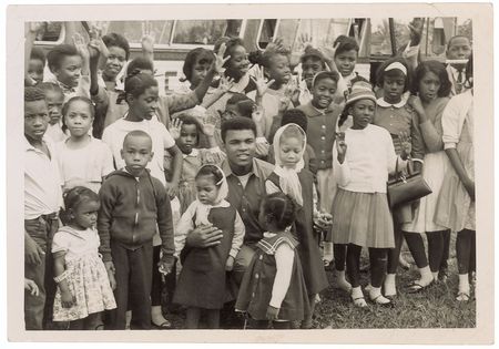 Lot #1378 Muhammad Ali: Remarkable personal photo with Malcolm X?s children, inscribed to a ?Brother? in the NOI the same year that he won the Heavyweight title and left behind ?Cassius Clay? - Image 2