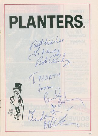 Lot #914 Beatles: Paul and Linda McCartney: Paul and Linda watch Liverpool on the pitch - Image 1