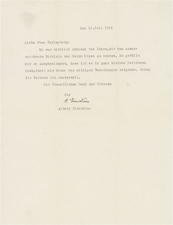 Lot #215 Albert Einstein: The 72-year-old Princeton professor enjoys a new book from the wife of filmmaker Paul Victor Falkenberg - Image 2
