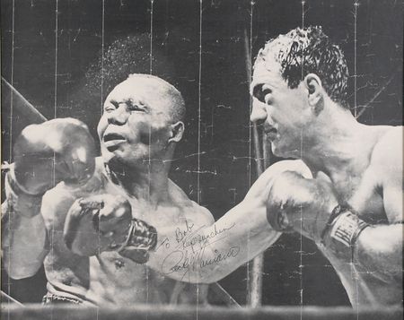 Lot #1323 Rocky Marciano: Enormous portrait of Marciano punishing Walcott - Image 2