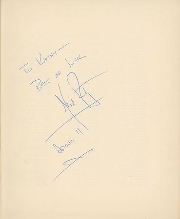Lot #515 Neil Armstrong: First man on the moon signs a NASA publication adding his mission - Image 1