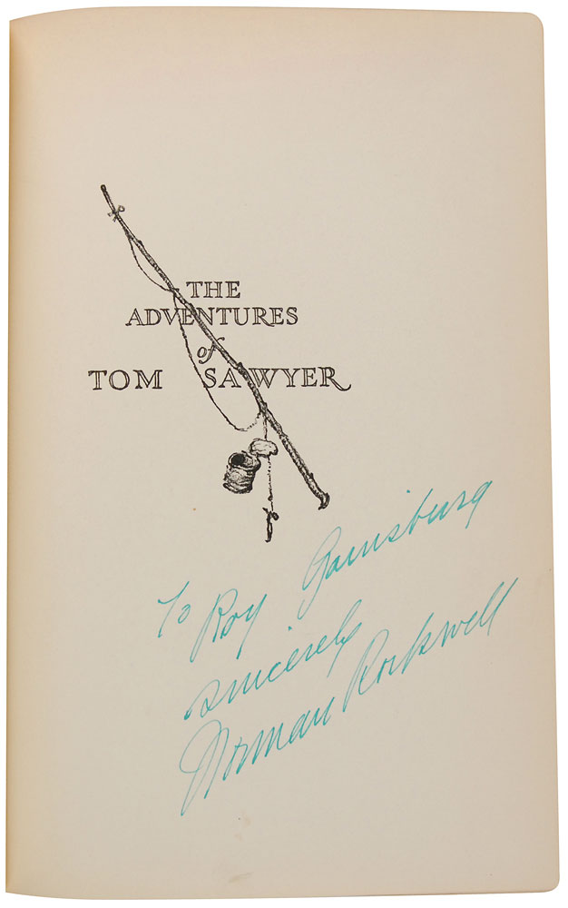 Lot 688 Norman Rockwell: Signing his illustrated editions of the Twain classics