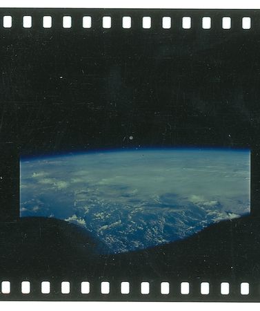 Lot #387 Gemini 7: Exceptional first-generation roll of color positives from the Hasselblad aboard Gemini 7, including the historic first space rendevous - Image 1