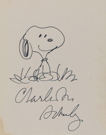 Lot #498 Snoopy Come Home movie book signed by Charles Schulz - Image 1