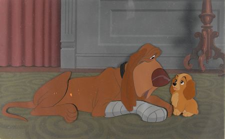 Lot #211 Trusty the Bloodhound and Baby Lady production cel and production background from Lady and the Tramp - Image 1
