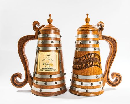 Lot #164 Harry S. Truman and William Hassett’s Pair of Large Oak Beer Steins - Image 1
