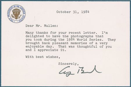 Lot #93 George and Barbara Bush: Bush throws the first pitch in the Tigers versus Padres 1984 World Series - Image 1