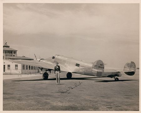 Lot #385 Amelia Earhart: Extraordinary image of Earhart and her vanished plane - Image 1