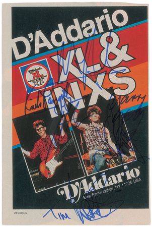 Lot #818 INXS Signed Magazine Ad - Image 1