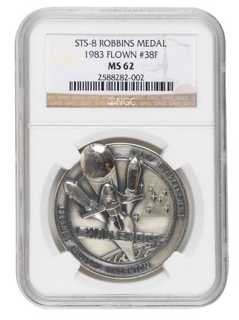Lot #329 STS-8 Flown Silver Robbins Medal - Image 1