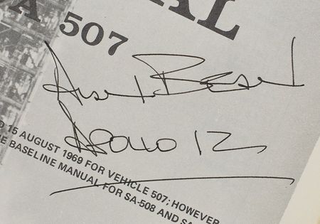 Lot #204 Alan Bean Signed Saturn V Manual - Image 1