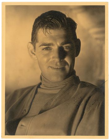 Lot #873 Clark Gable: Dashing oversized Clarence Sinclair Bull portrait of a young Gable - Image 1