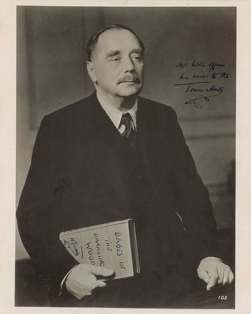 Lot #674 H. G. Wells: Desirable twice-signed literary pose - Image 1