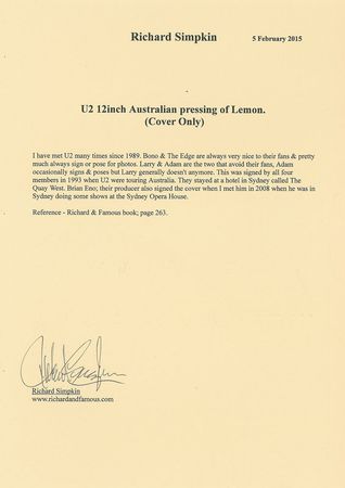Lot #7513 U2 Signed Album - Image 2